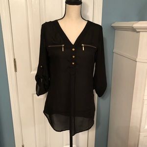 Tunic length blouse.